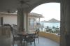 Private balcony with access from all suites. Includes wet bar & BBQ