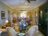 Living room view to kitchen and dining area in #1303 Villa La Estancia Cabo.