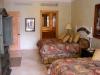 Third bedroom in unit #1101 with 2 double beds.