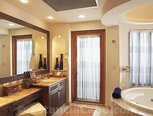 master bathroom in Penthouse 3806 with whirlpool tub and dual sinks.