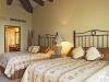 room with queen beds and private bathrooms in Penthouse 3806 Villa La Estancia Cabo.