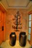 Villa entryway with decorative stone wall
